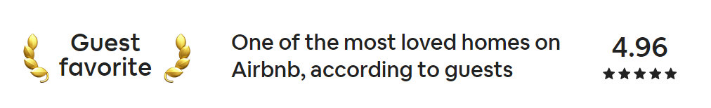 Text indicating a guest favorite rating for an Airbnb listing with a star rating and text.